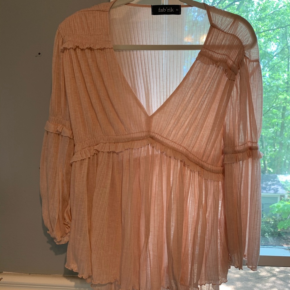 V-neck pink ruffle blouse